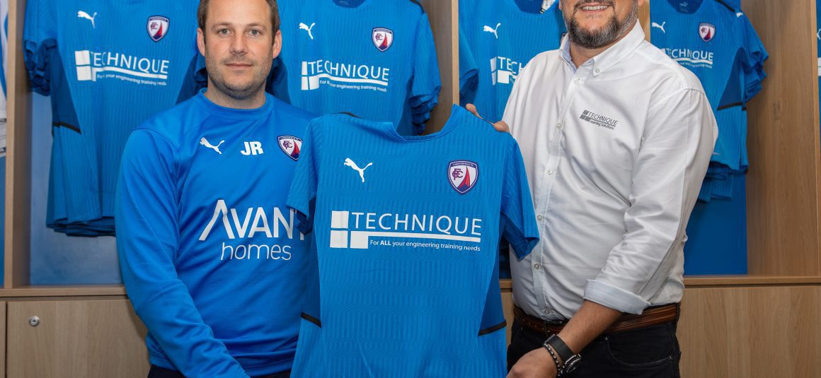 Main sponsor admires new kit Main sponsor admires new kit
